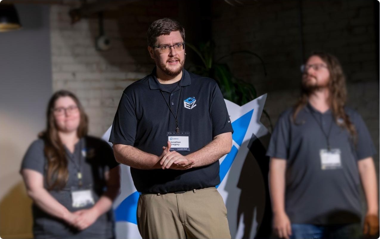Brandi Freie, Jonathan Gregory, and Kenton Hanifl representing EzBizPortal